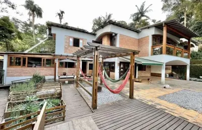 Casa em condomínio fechado com 3 quartos à venda na alameda júpiter, condomínio iolanda, taboão da serra, 398 m2 por r$ 1.840.000