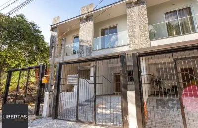 Casa com 3 quartos à venda na Rua Abdo Jorge Curi, 235, Parque Santa Fé, Porto Alegre