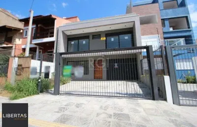 Casa com 3 quartos à venda na Rua Buarque de Macedo, 931, São Geraldo, Porto Alegre