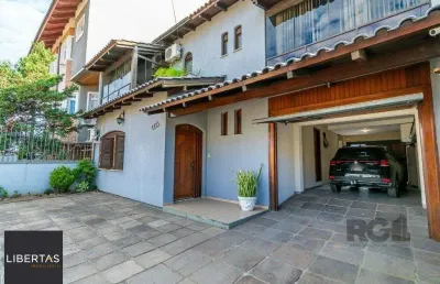 Casa com 4 quartos à venda na Rua Paulo Blaschke, 695, Jardim Itu Sabará, Porto Alegre
