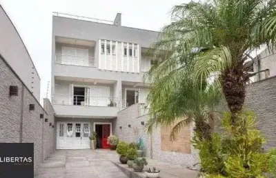 Casa com 4 quartos à venda na Rua Arnaldo Ballve, 512, Jardim Itu Sabará, Porto Alegre