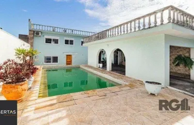 Casa com 4 quartos à venda na Rua Miracema, 134, Chácara das Pedras, Porto Alegre