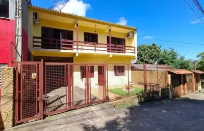 Casa com 4 quartos à venda na Rua Ventos do Sul, 140, Vila Nova, Porto Alegre