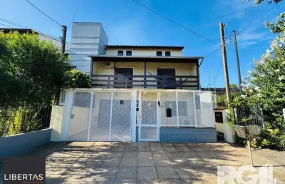 Casa com 4 quartos à venda na Rua Hermínio Bittencourt, 58, Hípica, Porto Alegre