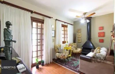 Casa com 4 quartos à venda na Rua São Sebastião do Cai, 50, Camaquã, Porto Alegre