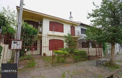 Casa com 5 quartos à venda na Rua Fátima, 344, Partenon, Porto Alegre