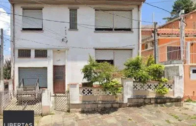 Casa com 3 quartos à venda na Rua Umbú, 389, Passo da Areia, Porto Alegre