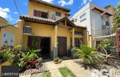 Casa com 4 quartos à venda na Rua Antônio Ribeiro, 160, Santo Antônio, Porto Alegre
