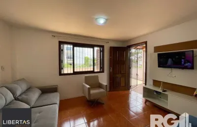 Casa com 4 quartos à venda na Rua Paulino Chaves, 735, Santo Antônio, Porto Alegre