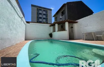 Casa com 3 quartos à venda na Rua Enfermeiro Ventura, 262, Vila Nova, Porto Alegre