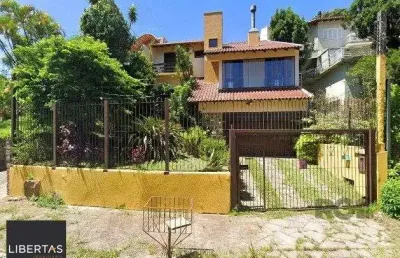 Casa com 4 quartos à venda na Rua Doutor Raul Franco Di Primio, 90, Teresópolis, Porto Alegre