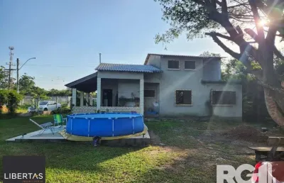 Casa com 4 quartos à venda na Beco Oito Mil e Dezesseis, 133, Lageado, Porto Alegre