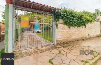 Casa com 3 quartos à venda na Rua Encantadora, 320, Partenon, Porto Alegre