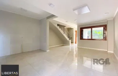 Casa com 3 quartos à venda na Rua Ronaldo Molina de Quadros, 420, Mário Quintana, Porto Alegre