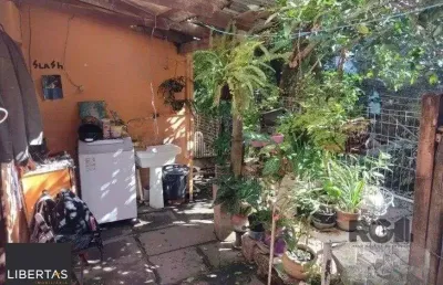 Casa com 2 quartos à venda na Rua Ibirubá, 325, Cavalhada, Porto Alegre