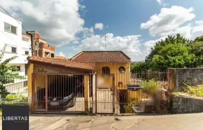 Casa com 4 quartos à venda na Rua Padre João Batista Reus, 2778, Camaquã, Porto Alegre