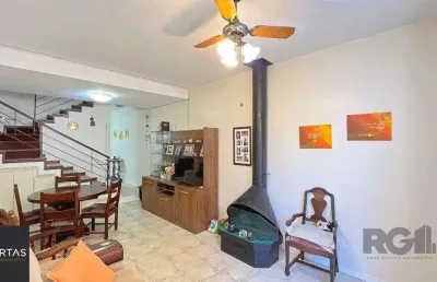 Casa em condomínio fechado com 3 quartos à venda na Avenida Arnaldo Bohrer, 184, Teresópolis, Porto Alegre