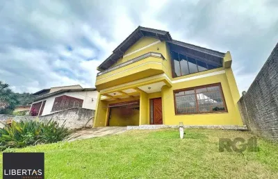 Casa com 3 quartos à venda na Rua Costa Lima, 479, Nonoai, Porto Alegre