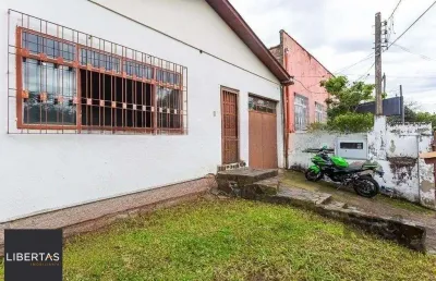 Casa com 3 quartos à venda na Rua Gomes de Freitas, 431, Jardim Itu Sabará, Porto Alegre