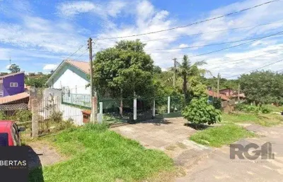 Casa com 3 quartos à venda na Rua Ênio de Souza, 226, Vila Nova, Porto Alegre