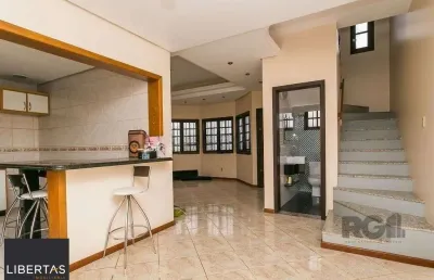 Casa com 3 quartos à venda na Rua Tomé Antônio de Souza, 267, Campo Novo, Porto Alegre