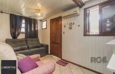 Casa com 4 quartos à venda na Avenida Ipê, 653, Vila Jardim, Porto Alegre