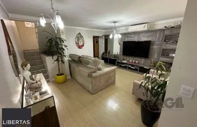 Casa com 4 quartos à venda na Rua Sérgio Porto, 308, Farrapos, Porto Alegre