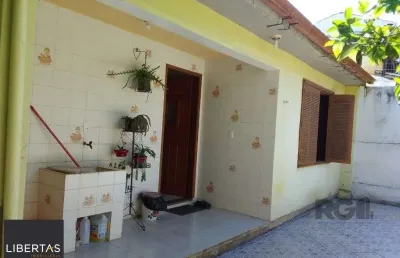 Casa de 4 quartos com 243,58m² no bairro lomba do pinheiro