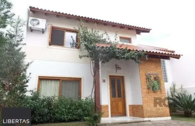 Excelente casa em condomínio com 3 dormitórios e 4 vagas.