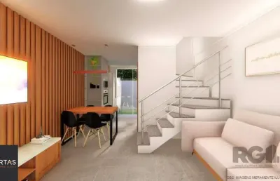 Casa estilo sobrado com 2 quartos e pátio, à venda no bairro vila nova, em porto alegre/rs