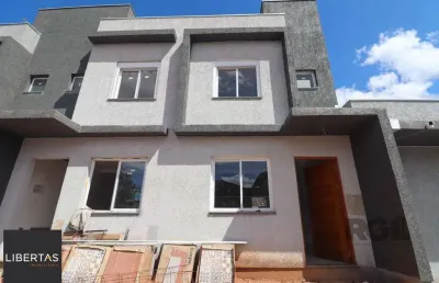 Casa em condomínio fechado com 2 quartos à venda na Rua Miguel Ascoleze, 125, Vila Nova, Porto Alegre