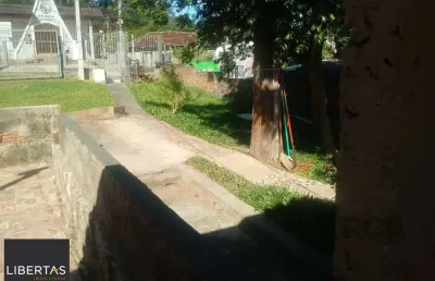 Terreno à venda na Rua Cachoeira, 71, Nonoai, Porto Alegre