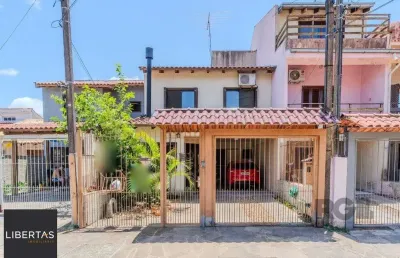 Casa com 3 quartos à venda na Rua Edgar Sanches Laurent, 77, Hípica, Porto Alegre