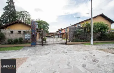 Casa em condomínio fechado com 4 quartos à venda na Avenida da Cavalhada, 6347, Cavalhada, Porto Alegre