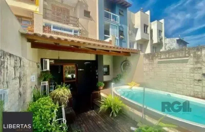 Casa de alvenaria, 3 dormitórios, 3 suítes, piscina.