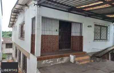 Casa com 3 quartos à venda na Avenida da Cavalhada, 4370, Cavalhada, Porto Alegre