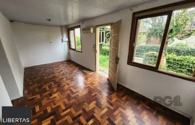 Casa em condomínio fechado com 3 quartos à venda na Rua Butuí, 673, Cristal, Porto Alegre
