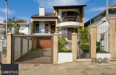 Casa com 4 quartos à venda na Rua Campos Elíseos, 196, Glória, Porto Alegre