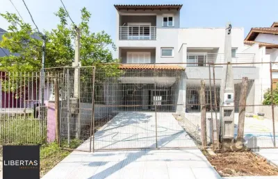 Casa com 3 quartos à venda na Rua Ari Peixoto Martins, 146, Espírito Santo, Porto Alegre