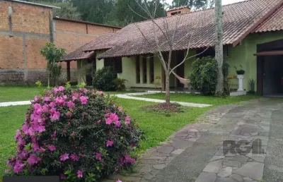 Casa com 4 quartos à venda na Avenida João Antônio Silveira, 8752, Restinga, Porto Alegre