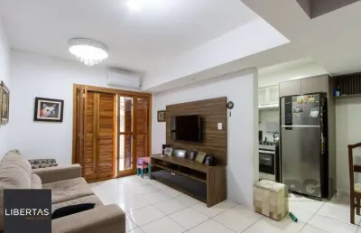 Casa em condomínio fechado com 3 quartos à venda na Rua São Sebastião do Cai, 119, Camaquã, Porto Alegre