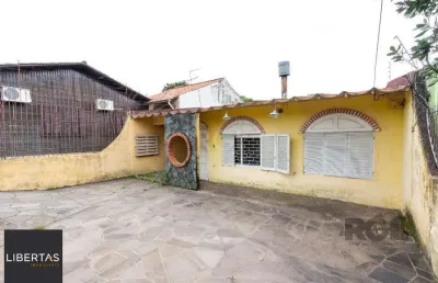 Casa com 3 quartos à venda na Estrada Aracaju, 70, Vila Nova, Porto Alegre