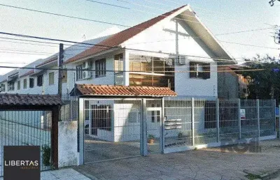 Casa em condomínio fechado com 3 quartos à venda na Rua Marquês do Maricá, 455, Vila Nova, Porto Alegre