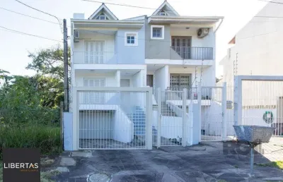 Casa com 3 quartos à venda na Rua Claudio da Silva Pinto, 608, Espírito Santo, Porto Alegre