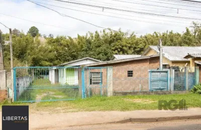 Casa com 7 quartos à venda na Estrada João Passuelo, 1181, Vila Nova, Porto Alegre