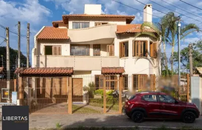 Casa com 4 quartos à venda na Avenida Guaíba, 2680, Ipanema, Porto Alegre