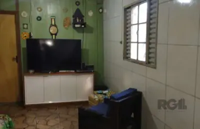 Casa com 3 quartos à venda na Rua Chico Pedro, 675, Camaquã, Porto Alegre