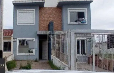 Casa com 2 quartos à venda na Rua Joel Iuchno, 29, Restinga, Porto Alegre