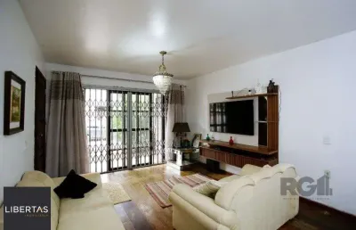 Casa com 3 quartos à venda na Rua Chile, 545, Jardim Botânico, Porto Alegre