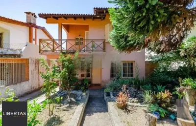 Casa com 6 quartos à venda na Rua Padre João Batista Reus, 708, Vila Conceição, Porto Alegre